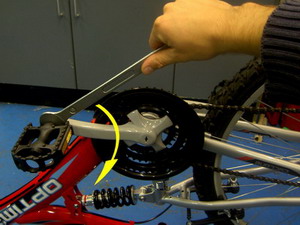 tightening pedals on a bike